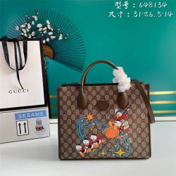 古奇官网女包Disney x Gucci唐老鸭印花托特包购物袋648134